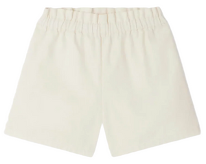 The Bonpoint Girls' Milly Short with Pockets features a plain, off-white design and an elastic waistband, shown against a white background.