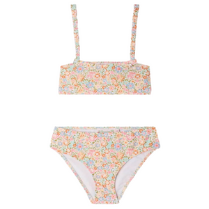 The Bonpoint Girls' Eyma Swimsuit Two-Piece features a Liberty print, a straight neckline top with thin straps, and matching bikini bottoms crafted from soft fabric.