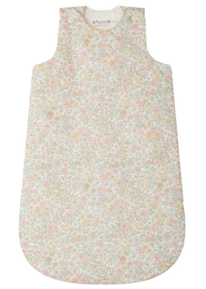The Bonpoint Baby Girls' Joujou Zipped Sleeping Bag features soft pink Liberty fabric and a gentle rounded shape—perfect as a newborn gift.