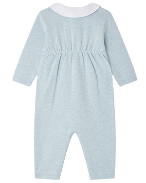 The Baby Boys' Anton Pajamas with Embroidered Rabbit Collar by Bonpoint are light blue, long-sleeved, crafted from soft ribbed cotton with a white Peter Pan collar, elastic waist, closed feet, and shown from the back.