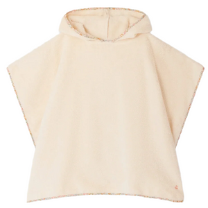 The Bonpoint Girls' Eneri Bath Poncho features soft cream-colored cotton terrycloth, short wide sleeves, a hood, and elegant Liberty fabric trim along the edges.