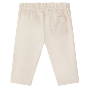 Bonpoint Baby Girls' and Girls' Luciole Pants in pink denim, with an elastic waistband and a single back pocket, are displayed flat on a plain background.