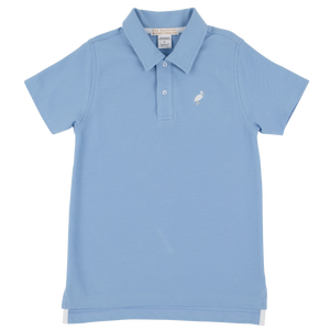The Beaufort Bonnet Company’s Baby Boys' and Boys' Prim & Proper Polo features light blue short sleeves, a collar with two buttons, and a small embroidered bird logo for a classic preppy style.