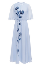 The Thessaly Dress by Altuzarra is an elegant light blue maxi with short flutter sleeves, a cinched waist, and dark blue floral embroidery—perfect for special occasions.