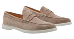 The Peter Millar Excursionist Penny Loafer is a light brown suede shoe with a water-resistant finish, white rubber soles, penny strap detail, and a lightweight EVA outsole for all-day comfort.