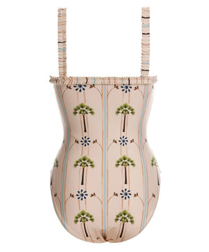 The Limon One Piece by Agua By Aguabendita is a recycled polyester swimsuit with vertical stripes, palm tree and floral prints, ruffled shoulder straps, and a ruffled neckline.