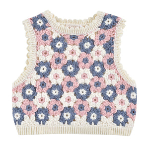 The Girls' Rynia Vest by Louise Misha is a sleeveless cotton-blend crochet sweater featuring pink, blue, and white floral hexagons with beige ribbed edges and trim.