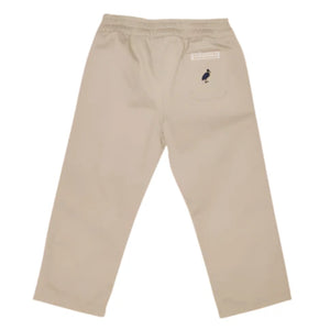 The Beaufort Bonnet Company Baby Boys' and Boys' Sheffield Pants in beige, shown from the back, have an elastic waistband and a single pocket with a small embroidered bird detail.