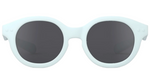 The IZIPIZI #c Polarized Sunglasses feature a round light blue frame and dark polarized lenses with UV protection, displayed on a white background.