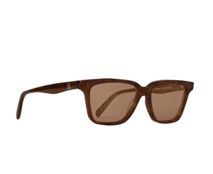 Toteme Square Sunglasses feature a rectangular brown acetate frame with matching lenses, wide temples, and UV protection, shown against a white background.