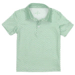 The Boys' Inlet Polo by Properly Tied is a green shirt with short sleeves, a collar, moisture-wicking fabric, and a white circular pattern.