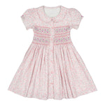 Explore the Antoinette Baby Girls' and Girls' Violette Floral Short Puff Smocked Dress. This chic pink summer dress features a Peter Pan collar, embroidered bodice details, and a button-down front for true French elegance.