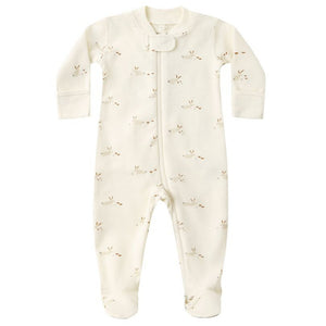 The Quincy Mae Baby Girls' Zip Long Sleeve Sleeper Footie features cream-colored soft organic brushed jersey with a subtle brown bunny face pattern, a front zipper, and snap closure at the neckline.