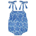 Mer Baby Girls' Zoe Romper in blue and white pattern, featuring shoulder tie straps and playful tassel details, shown on a white background.