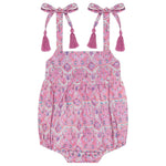 The Mer Baby Girls' Zoe Romper features a pink paisley pattern, shoulder tie accents, and playful tassel details, shown flat on a white background.