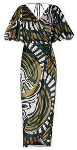 The Cada Instante Dress by Andres Otalora is knee-length with a bold green, brown, and white abstract pattern. It boasts short puff sleeves, a wrap-style V-neck front, and a cinched waist with a tie.