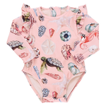 Explore the Mediterranean Baby Girls' Rachel Suit by Pink Chicken: a pink long-sleeve swimsuit with watercolor shells and sea life patterns, featuring charming ruffled shoulders from our Resort Collection.