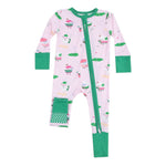 The Angel Dear Baby Golf Pros 2-Way Zipper Romper is a pink onesie with green trim, long sleeves, a diagonal zipper, and signature golf-themed prints, made from Viscose from Bamboo.