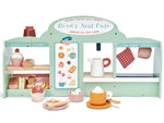 The Bird's Nest Cafe by Tender Leaf Toys is a wooden play set with pastries, cups, teapots, a cafe sign, painted shelves, and tea towels—perfect for creative pretend play as a coffee shop.