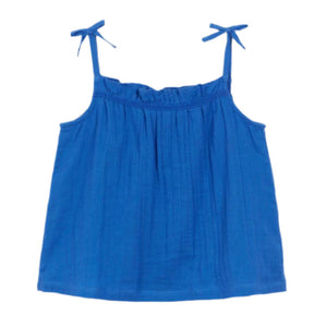 The Girls' Frida Top by Arsene & Les Pipelettes is a sleeveless blue gauze tank featuring gathered fabric and adjustable shoulder straps tied in bows, designed in the brand’s signature style.