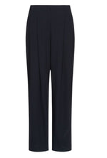 The Carries Trouser by TWP is a pair of high-rise, oversized black wool crepe trousers with front pleats and straight legs, shown on a white background.