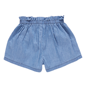 The Girls' Theodore Short by Pink Chicken showcases a medium wash chambray with an elastic, ruffled waistband and a loose fit for comfort.