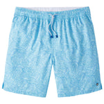 The Peter Millar Tropics Swim Trunk features a light blue color with a white drawstring and subtle palm tree print, made from four-way stretch fabric, shown laid flat on a white background.