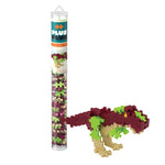 A Tube - T.Rex by Plus Plus sits beside a completed green, tan, and dark red dinosaur model—an engaging STEM toy that inspires creative play and helps develop fine motor skills.
