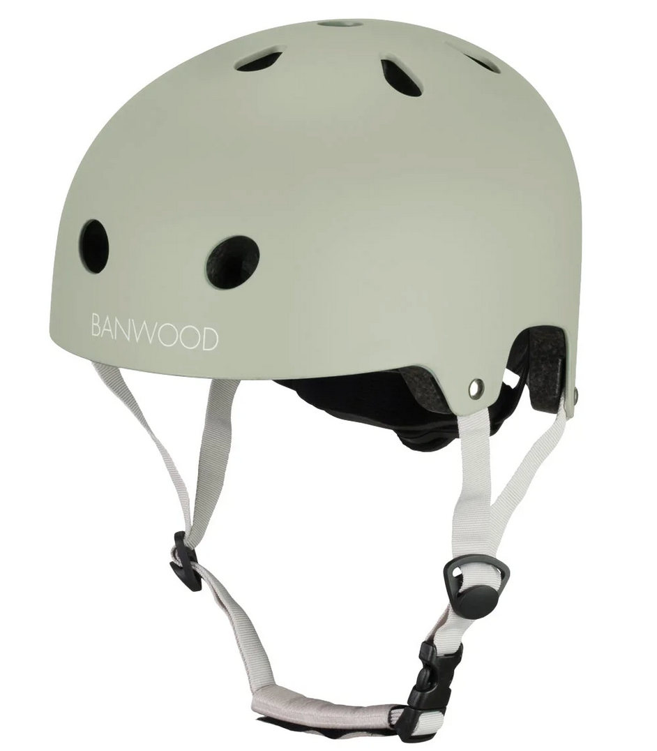 The Banwood Eco Helmet offers a light gray classic look with ventilation holes, white adjustable straps, and a black buckle—crafted from recycled materials for sustainable style.