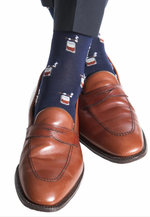 Pairing Bourbon with Cigars Mid Calf Socks in navy and brown by Dapper Classics with brown leather loafers exudes a stylish vibe. These breathable, linked-toe socks ensure comfort and elevate any outfit.