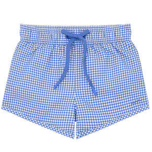 The Boys' Sky Blue Gingham Boardie by Minnow has a blue and white checkered pattern, an elastic waistband, and a blue drawstring, ideal for boys.