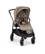 The Nuna SWIV Stroller is a modern beige stroller with a black frame, four 360-degree swivel wheels, a safety harness, detachable bumper bar, and storage basket—designed for the spontaneity of parenthood.