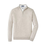 The Peter Millar Excursionist Flex Quarter-Zip Sweater in light beige Merino wool for men is shown layered over a white dress shirt, set against a plain white background.