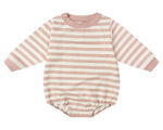 The Quincy Mae Baby Crewneck Bubble Romper, in pink and white French terry stripes with matching pink cuffs, collar, and leg openings, is perfect for your baby’s transitional wardrobe.