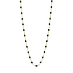 The Classic Gigi Necklace 16.5" by Gigi Clozeau is a stunning piece crafted in 18 carat yellow gold, featuring small black beads elegantly spaced along the chain.