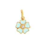 The Gigi Clozeau Flower Pendant Diamond showcases turquoise petals in 18 carat Yellow Gold, accented by a dazzling central diamond.