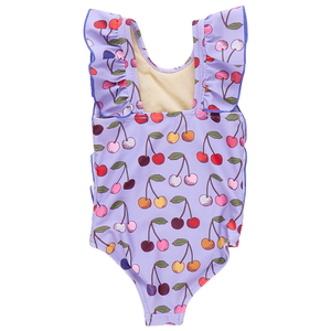 Introducing the Pink Chicken Girls' Katniss Suit, a charming children's swimsuit featuring vibrant cherry patterns and delightful ruffled shoulder straps for a playful, stylish swim-time experience.