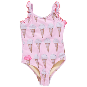 The Baby Girls' Claire Suit by Pink Chicken is a charming pink one-piece swimsuit featuring ruffled straps and playful Neapolitan ice cream cones, embodying the brand's whimsical style.