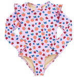 The Pink Chicken Girls' Rachel Suit is a pink one-piece swimsuit for children, featuring long sleeves, a playful strawberry pattern, and ruffled shoulders.
