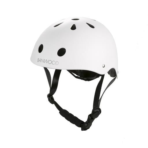 The Banwood Children’s Helmet features a white finish, ventilation holes, a black adjustable chin strap with buckle, and protective inner foam, shown against a plain background.