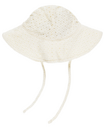The Rylee & Cru Floppy Sun Hat features a cream hue, wide brim, perforated design, and dual chin straps—ideal for sunny garden days or adding a fun touch to any floral print outfit. Displayed on a white background.