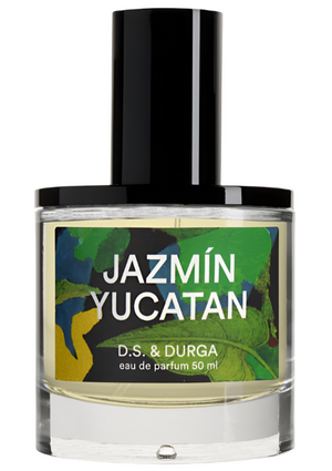 A 50 ml bottle of D. S. & Durga Jazmin Yucatan features a vibrant label with green and blue leafy patterns, evoking snake plants and jazmín yucateco, capturing the essence of ancient limestone ruins.