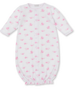 The Kissy Kissy Whale Wonder Printed Convertible Gown features soft Pima cotton, long sleeves, front button closure, a charming whale print, and an elasticized bottom hem for easy changes—perfect comfort for your little one.