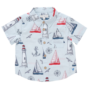 Pink Chicken Boys' Jack Shirt with a nautical print—sailboats, lighthouses, anchors, compasses, and seagulls in red and blue. Perfect short-sleeve shirt for little sailors' nautical adventures.