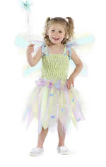 A child dances joyfully like a fairy, wearing the Great Pretenders Butterfly Dress with Wings and Wand.