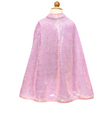The pink Sequins Cape by Great Pretenders is lightweight and designed for children, showcased on a wooden knob-head mannequin, featuring an easy Velcro closure.