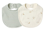 The Quincy Mae Jersey Snap Bib 2-Pack includes one green and white striped bib and one cream bib with animal and tree designs, both made from soft brushed jersey with snap closures.