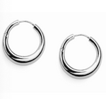 The Andrea Earrings by Lie Studio are small, thick silver hoops displayed on a white background—classic jewelry to elevate any look.