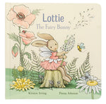 The cover of Jellycat's "Lottie Fairy Bunny Book" features a fairy bunny in a pink dress with a dandelion, sitting on a tree stump with flowers, bees, and dragonflies. This joyful story brings Lottie's enchanting world to life with beautiful illustrations.