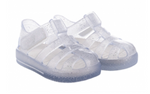 The Igor Girls' Star Jelly Sandal features translucent, glittery PVC material with adjustable straps and closed toes.